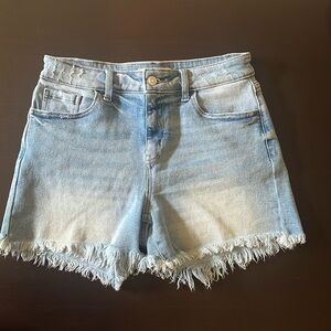 Zenana, raw hem denim shorts with light distressing. In good condition, size M